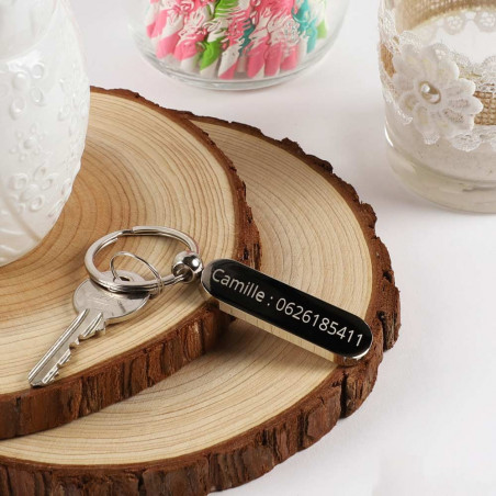 Porta porta chiave in forma ovale inciso  Porta porta chiave in forma ovale inciso