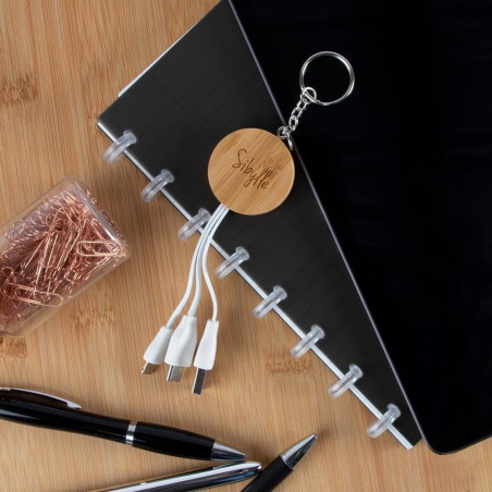 Portachiavi in incisione testo in legno per caricare il telefono Portachiavi in incisione testo in legno per caricare il telefono