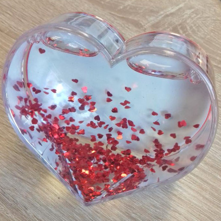 Foto del cuore di palla di neve Foto del cuore di palla di neve