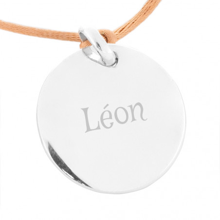 Testo inciso su medaglione rotondo in argento Testo inciso su medaglione rotondo in argento